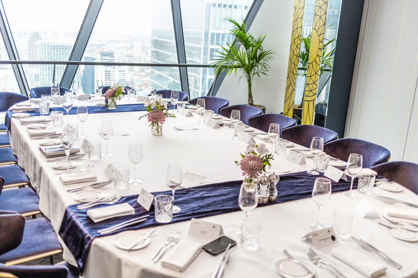 A private roundtable dinner set high above the London skyline
